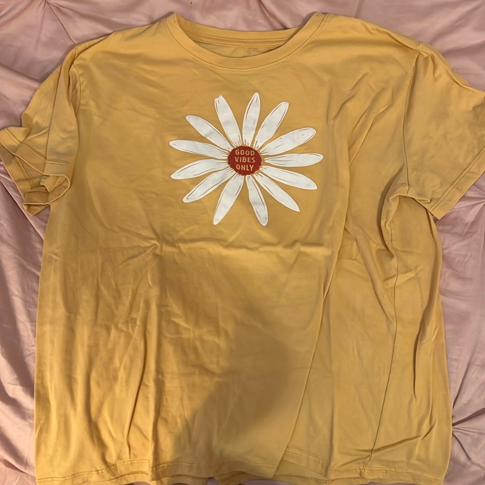 yellow graphic tee shirt